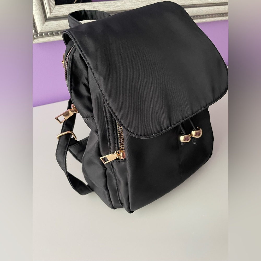 Medium size backpack with cheetah print lining - Picture 3 of 9